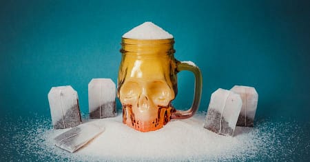 Quais são os danos do açúcar para adultos e crianças?
